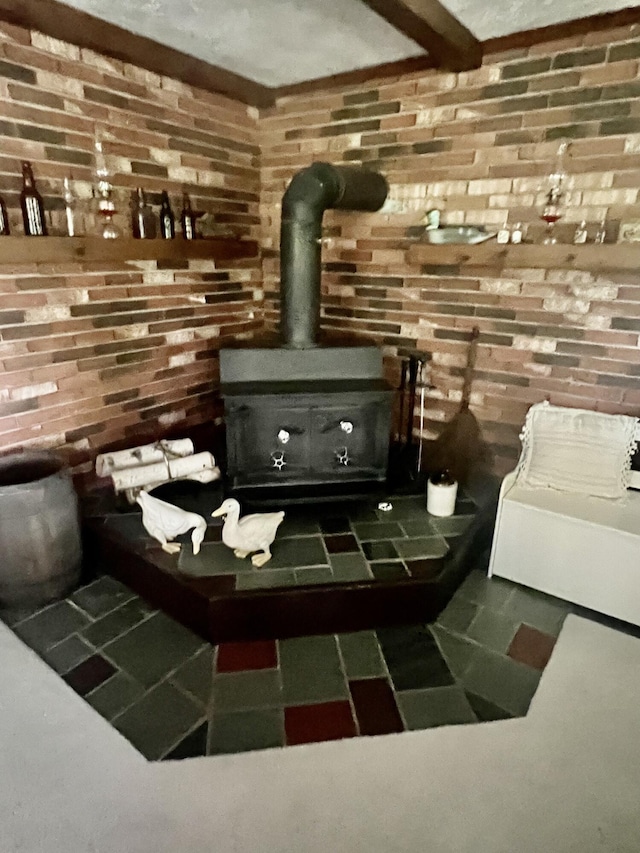 268 Yorke Trl, Grayling, MI 49738 - detailed view of a wood stove and brick wall