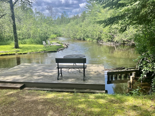 268 Yorke Trl, Grayling, MI 49738 - dock featuring a wooded view and a water view