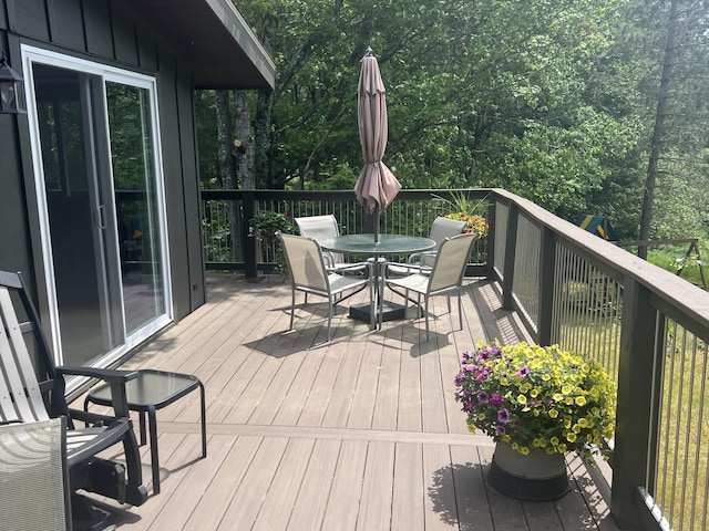 268 Yorke Trl, Grayling, MI 49738 - wooden terrace featuring outdoor dining area