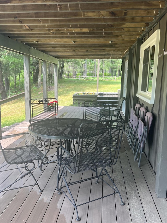 268 Yorke Trl, Grayling, MI 49738 - deck with outdoor dining area and a yard