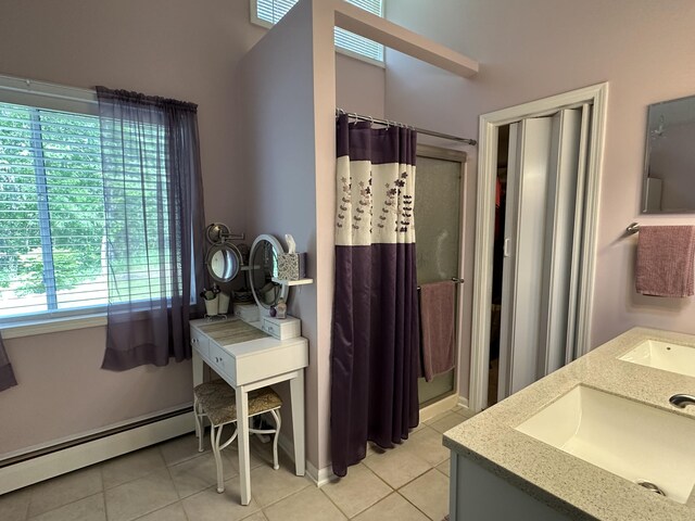 2131 Big Buck Dr, Lewiston, MI 49756 - full bath with a baseboard radiator, curtained shower, tile patterned floors, and double vanity