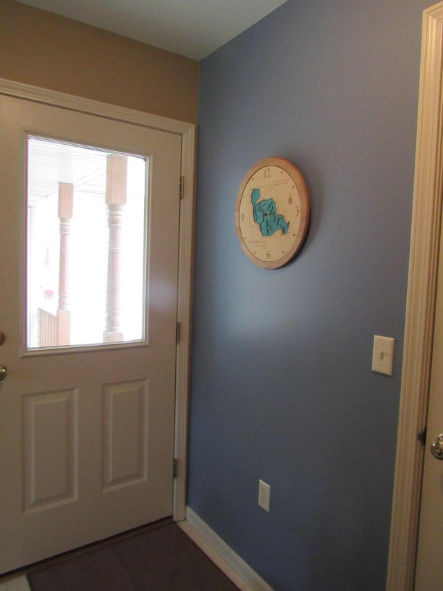 201 White Deer Trl, Prudenville, MI 48651 - foyer entrance featuring baseboards
