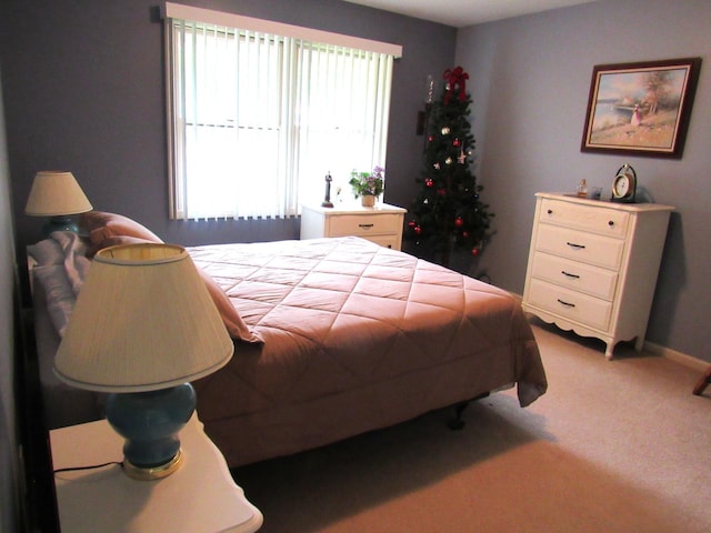 201 White Deer Trl, Prudenville, MI 48651 - carpeted bedroom featuring baseboards
