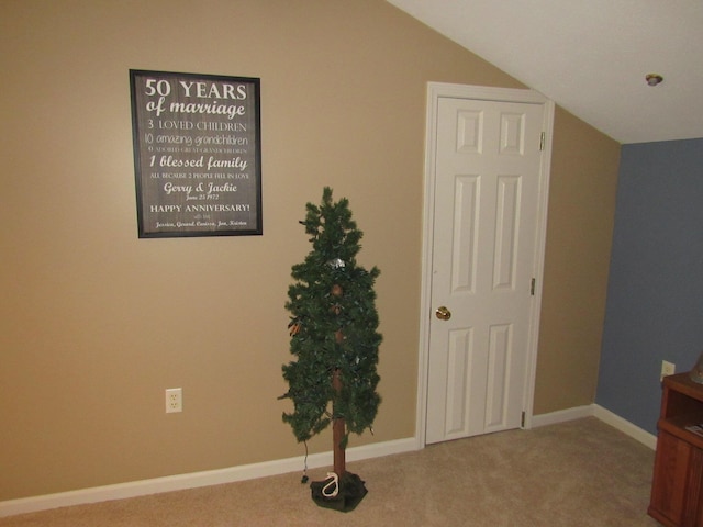 201 White Deer Trl, Prudenville, MI 48651 - interior space featuring vaulted ceiling and carpet