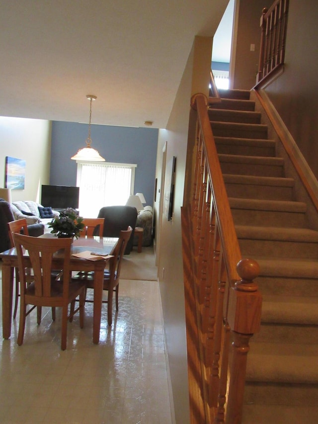 201 White Deer Trl, Prudenville, MI 48651 - dining room featuring stairway