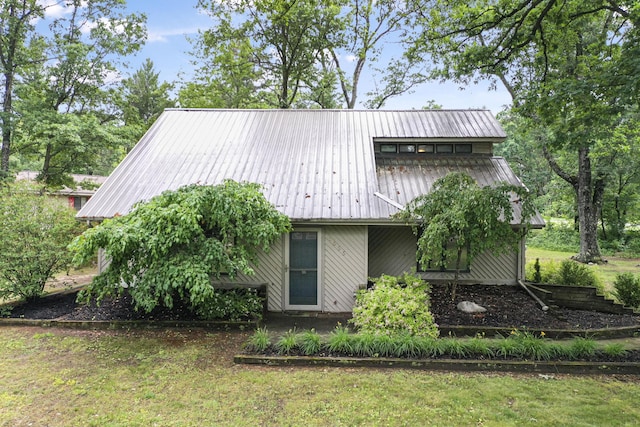 1655 Arrowhead Trl, West Branch, MI 48661 - view of front of house featuring a metal roof