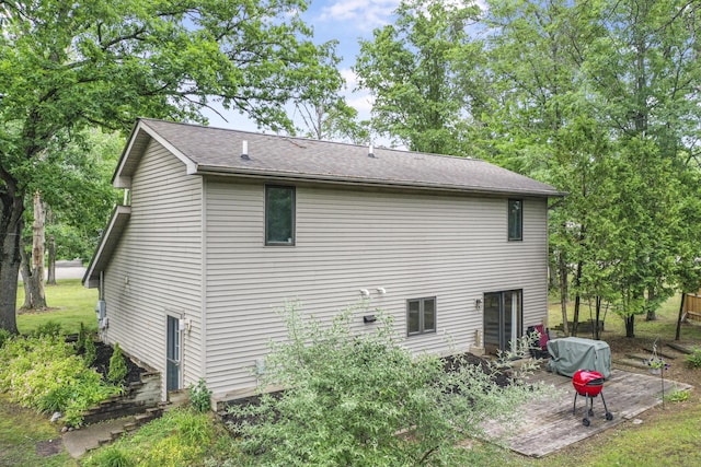 1655 Arrowhead Trl, West Branch, MI 48661 - rear view of property with a patio area