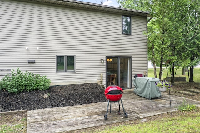 1655 Arrowhead Trl, West Branch, MI 48661 - rear view of house featuring a wooden deck