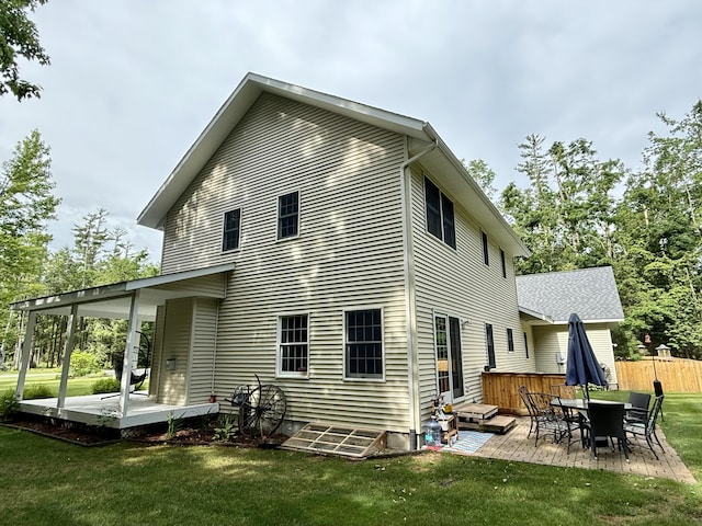 2176 Deepwoods Dr, Gaylord, MI 49735 - back of property featuring a patio