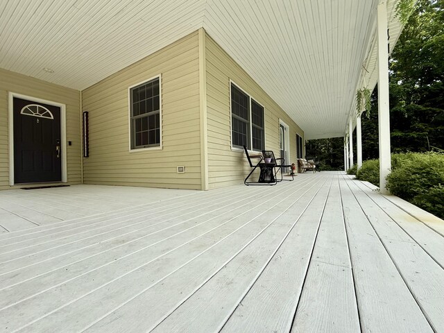 2176 Deepwoods Dr, Gaylord, MI 49735 - view of wooden porch