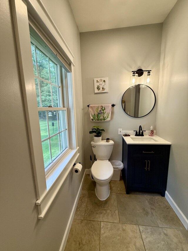 2176 Deepwoods Dr, Gaylord, MI 49735 - half bathroom featuring baseboards and vanity