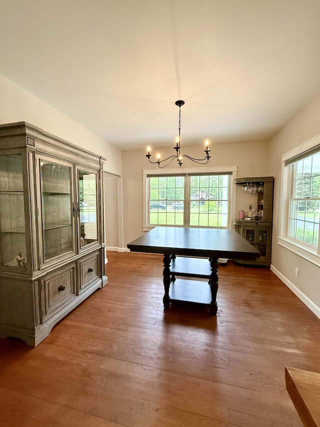 2176 Deepwoods Dr, Gaylord, MI 49735 - game room featuring a chandelier and wood finished floors