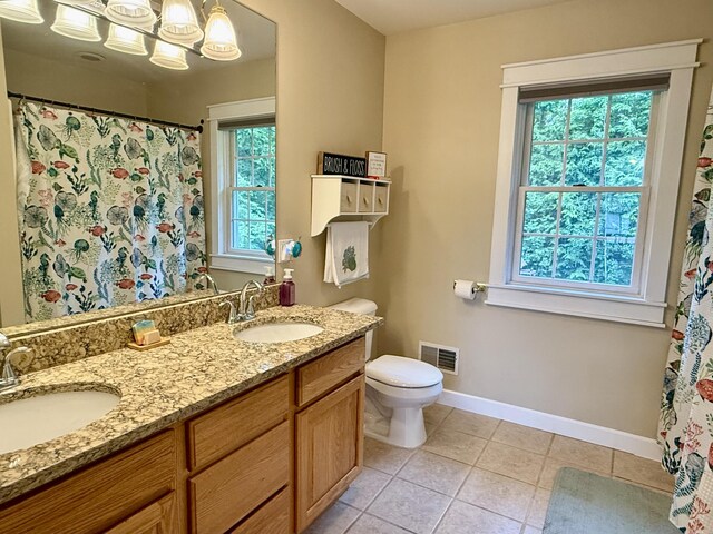 2176 Deepwoods Dr, Gaylord, MI 49735 - bathroom featuring tile patterned floors, double vanity, a shower with curtain, and a chandelier