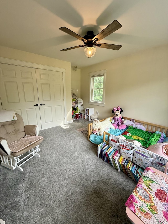 2176 Deepwoods Dr, Gaylord, MI 49735 - carpeted bedroom with ceiling fan and a closet