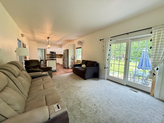 2176 Deepwoods Dr, Gaylord, MI 49735 - living area with carpet