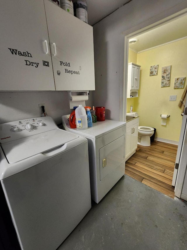 7451 June Ave, Saint Helen, MI 48656 - washroom with separate washer and dryer and baseboards