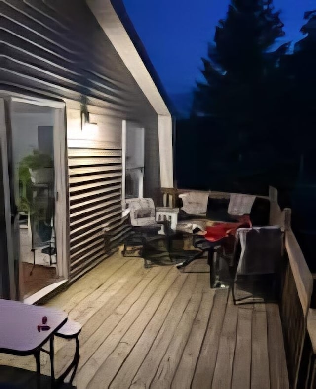 7451 June Ave, Saint Helen, MI 48656 - view of deck at night