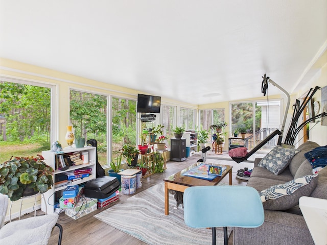 2651 Chipmunk Trl, Grayling, MI 49738 - sunroom with healthy amount of natural light and wood finished floors