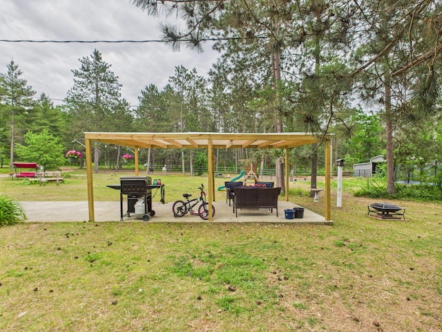 2651 Chipmunk Trl, Grayling, MI 49738 - view of property's community with a fire pit