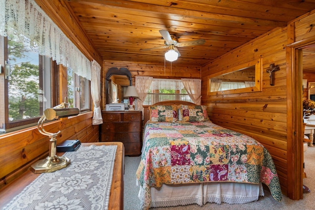 1960 Highbank Trl, Lewiston, MI 49756 - carpeted bedroom featuring wooden walls and wood ceiling