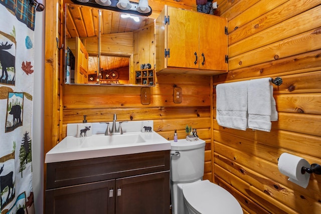 1960 Highbank Trl, Lewiston, MI 49756 - full bathroom featuring vanity and wooden walls