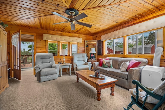 1960 Highbank Trl, Lewiston, MI 49756 - living area with wooden ceiling, wood walls, ceiling fan, and carpet flooring