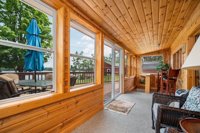 1960 Highbank Trl, Lewiston, MI 49756 - sunroom / solarium featuring carpet floors, wooden walls, vaulted ceiling, and wooden ceiling