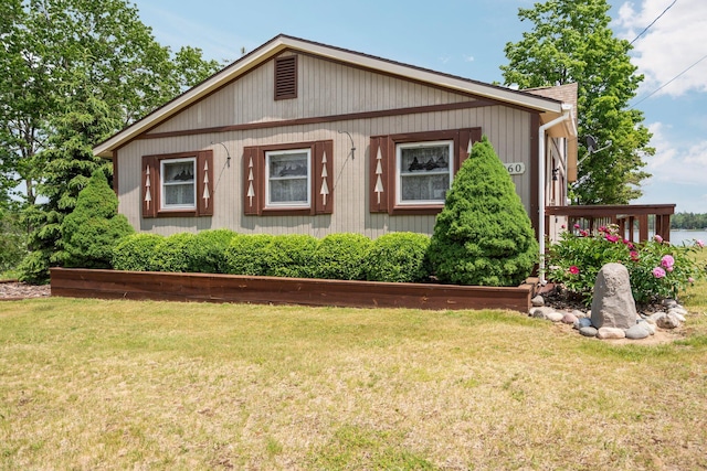 1960 Highbank Trl, Lewiston, MI 49756 - view of front of property with a front yard