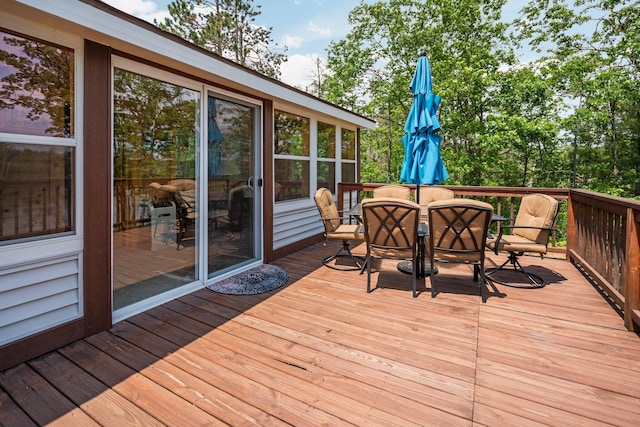 1960 Highbank Trl, Lewiston, MI 49756 - deck featuring outdoor dining area