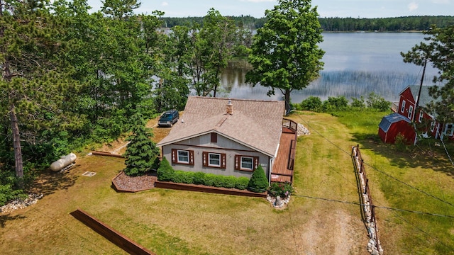 1960 Highbank Trl, Lewiston, MI 49756 - view from above of property with a large body of water and a heavily wooded area