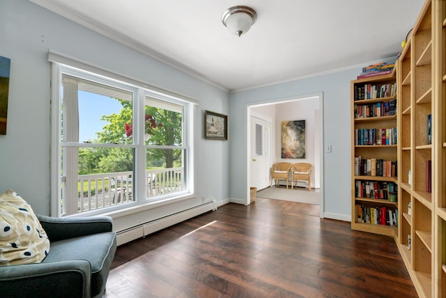 9660 Richardson Rd, Cheboygan, MI 49721 - sitting room with baseboard heating, crown molding, and dark wood-style floors