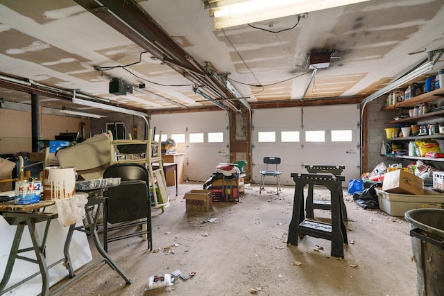 9660 Richardson Rd, Cheboygan, MI 49721 - garage featuring a garage door opener