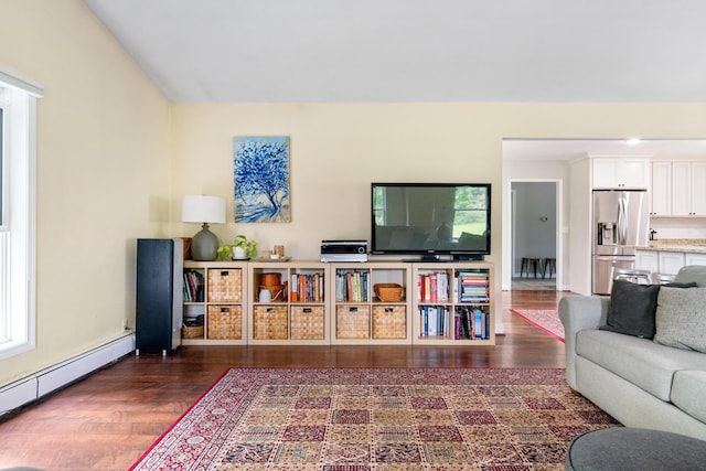 9660 Richardson Rd, Cheboygan, MI 49721 - living area featuring a baseboard radiator and wood finished floors