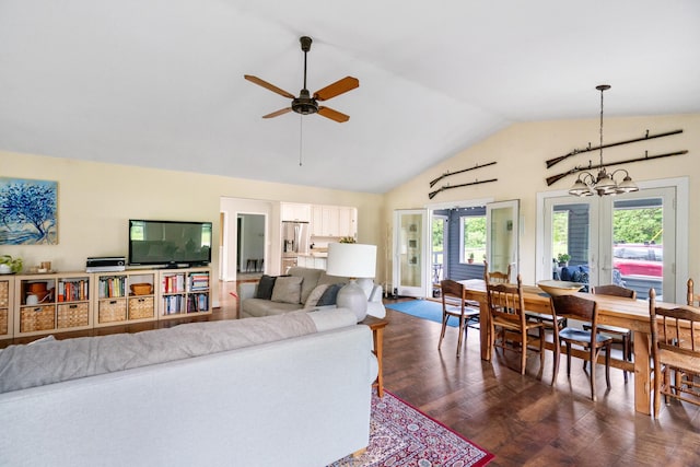 9660 Richardson Rd, Cheboygan, MI 49721 - living room with a ceiling fan, high vaulted ceiling, and a chandelier
