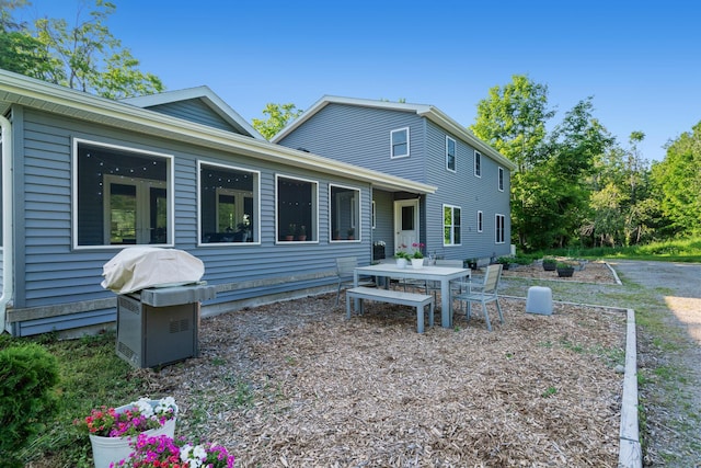 9660 Richardson Rd, Cheboygan, MI 49721 - back of property with outdoor dining space