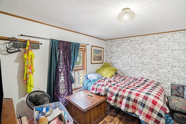 6304 Old 27, Vanderbilt, MI 49795 - bedroom with ornamental molding, wood finished floors, and a textured ceiling