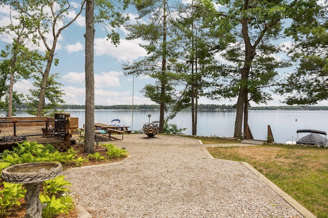 2061 Dreamers Ln, Lewiston, MI 49756 - water view featuring a boat dock