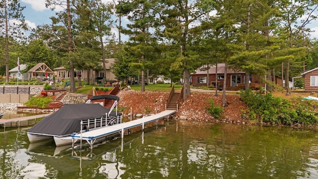 2061 Dreamers Ln, Lewiston, MI 49756 - dock area with stairs, a water view, and boat lift