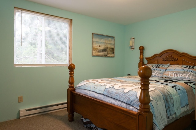 4696 Glacial Field Dr, Elmira, MI 49730 - carpeted bedroom featuring baseboard heating and multiple windows