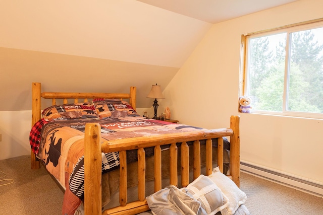 4696 Glacial Field Dr, Elmira, MI 49730 - carpeted bedroom featuring baseboard heating, multiple windows, and vaulted ceiling
