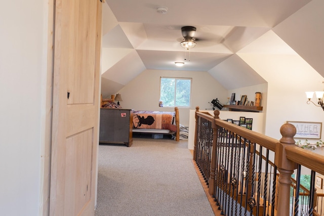 4696 Glacial Field Dr, Elmira, MI 49730 - bedroom with light carpet and vaulted ceiling