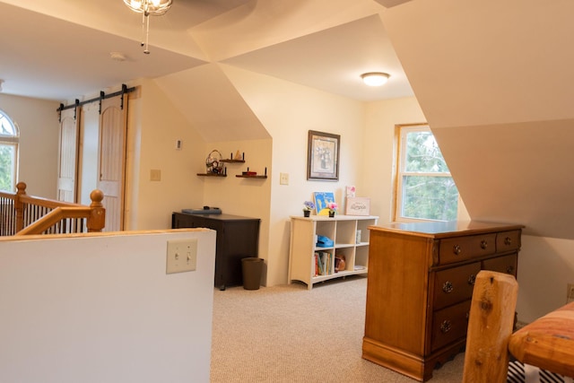 4696 Glacial Field Dr, Elmira, MI 49730 - carpeted office featuring a barn door