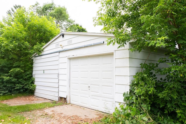 210 N Maple St, Mancelona, MI 49659 - view of garage