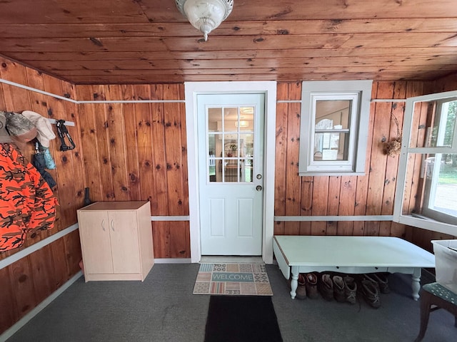 3628 Rau Rd, West Branch, MI 48661 - doorway to outside featuring wooden ceiling and wood walls