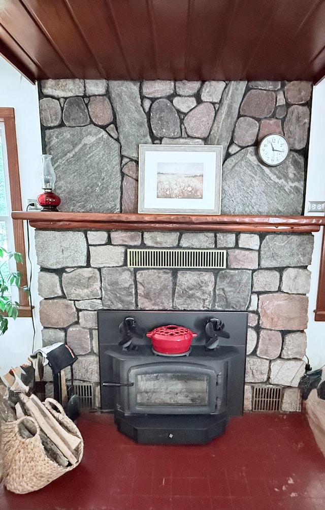 3628 Rau Rd, West Branch, MI 48661 - detailed view of a wood stove and wood ceiling