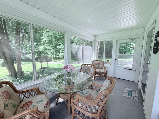 3628 Rau Rd, West Branch, MI 48661 - sunroom with healthy amount of natural light and carpet floors