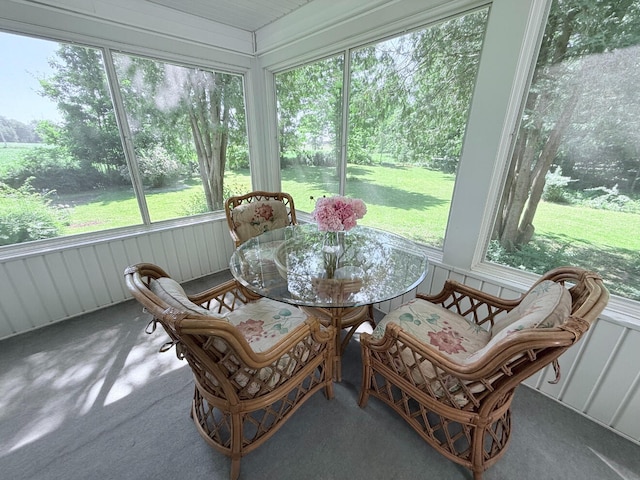 3628 Rau Rd, West Branch, MI 48661 - sunroom featuring carpet flooring, outdoor dining space, and plenty of natural light