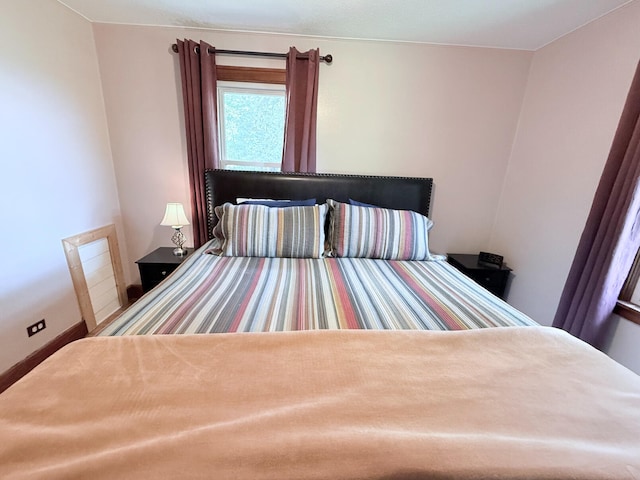 3628 Rau Rd, West Branch, MI 48661 - bedroom with baseboards