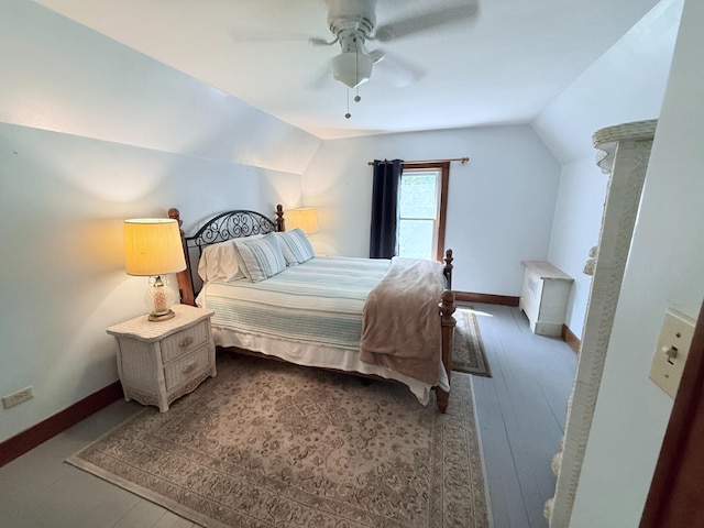 3628 Rau Rd, West Branch, MI 48661 - bedroom with lofted ceiling, ceiling fan, and hardwood / wood-style flooring