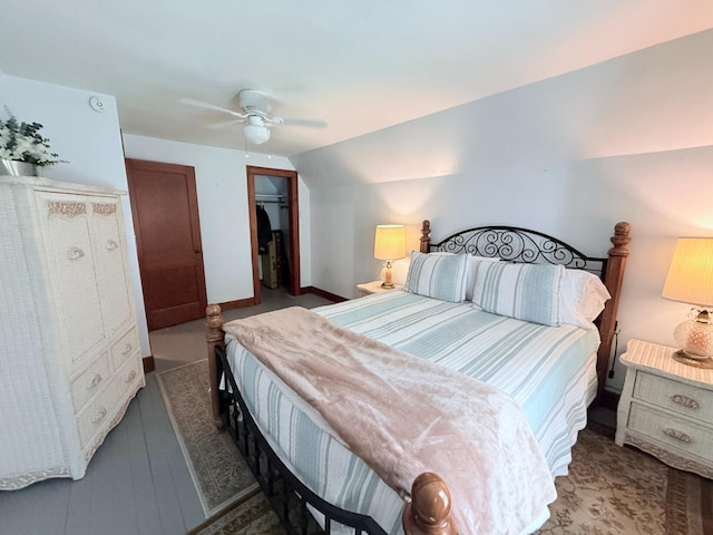3628 Rau Rd, West Branch, MI 48661 - bedroom featuring a closet, lofted ceiling, and ceiling fan